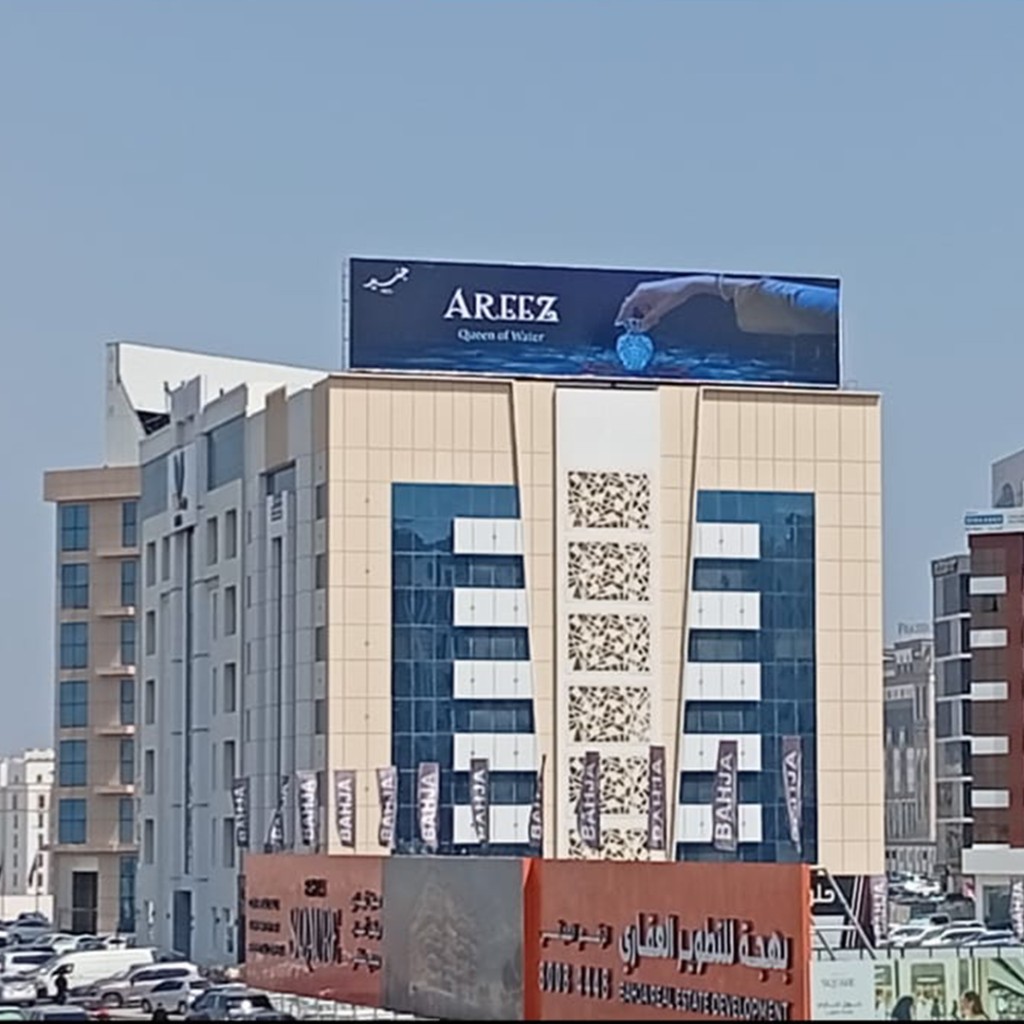 AREEZ fragrance campaign rooftop billboard in Muscat