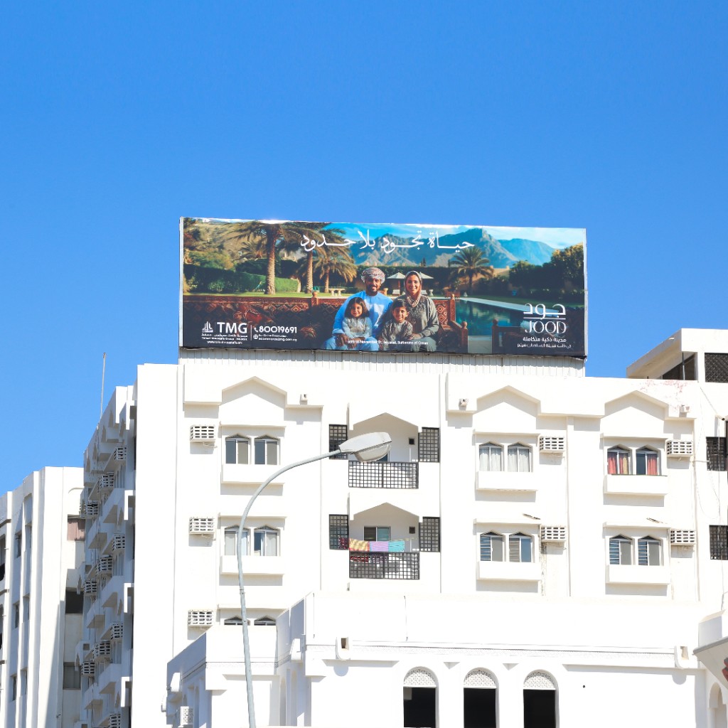 JOOD rooftop billboard with TMG branding in Muscat